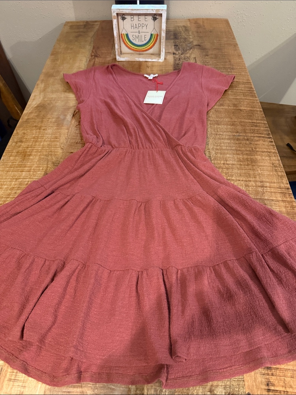 Women’s Tiered Wrap-Front Dress in a deep sienna color (pumpkin spice)